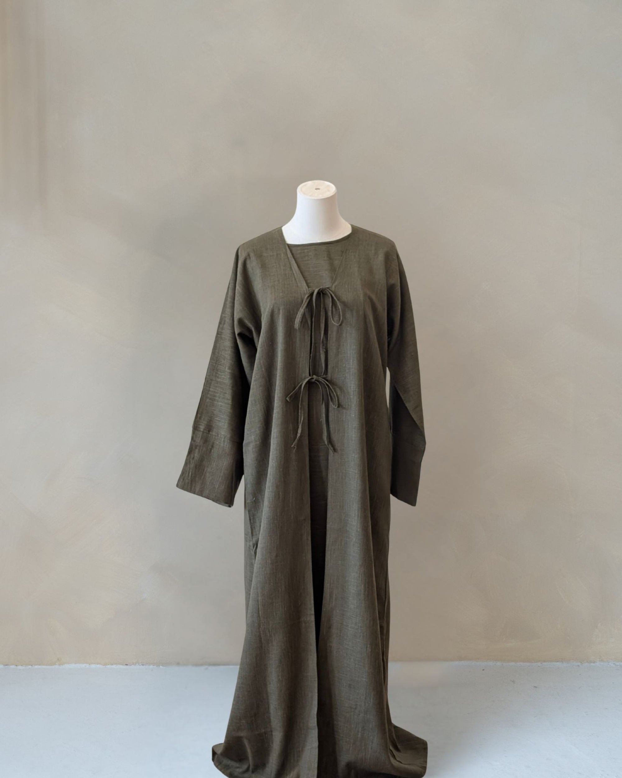 linen abaya in green by veilandco
