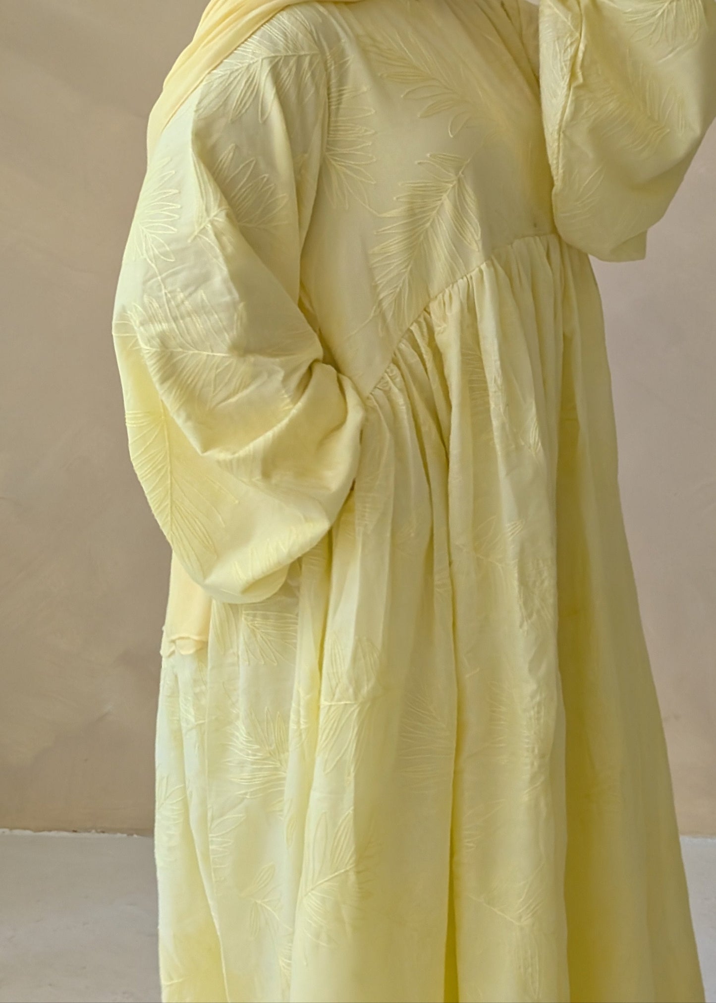 Butter Yellow nursing-friendly abaya made from 100% cotton, breathable, modest, and practical for mothers.