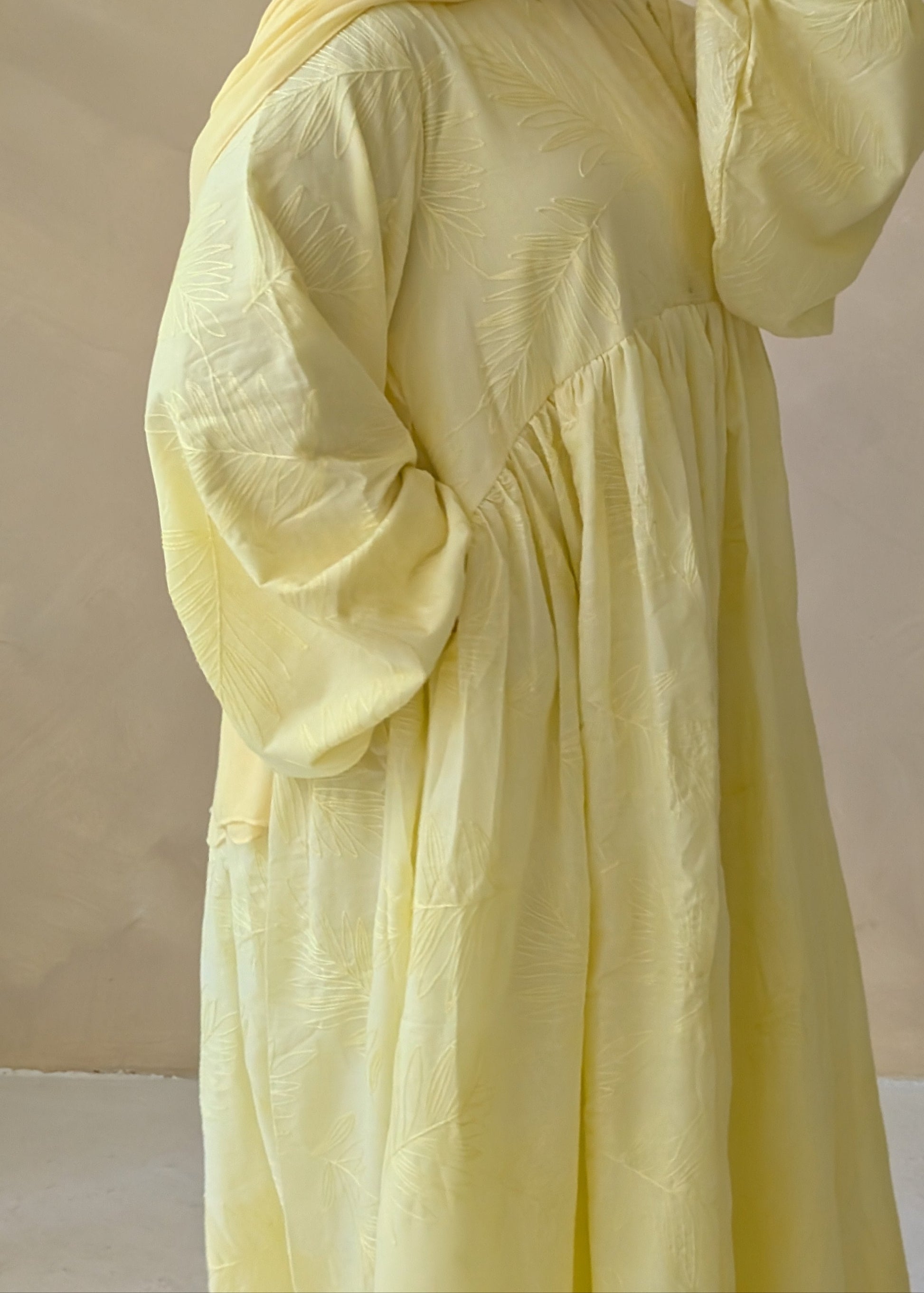 Butter Yellow nursing-friendly abaya made from 100% cotton, breathable, modest, and practical for mothers.